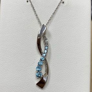 10K White gold Blue Topaz graduated ribbon pendant
